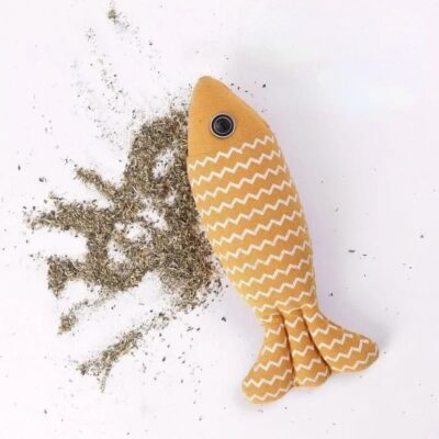 Yellow striped fish cat toy with zigzag pattern next to catnip.